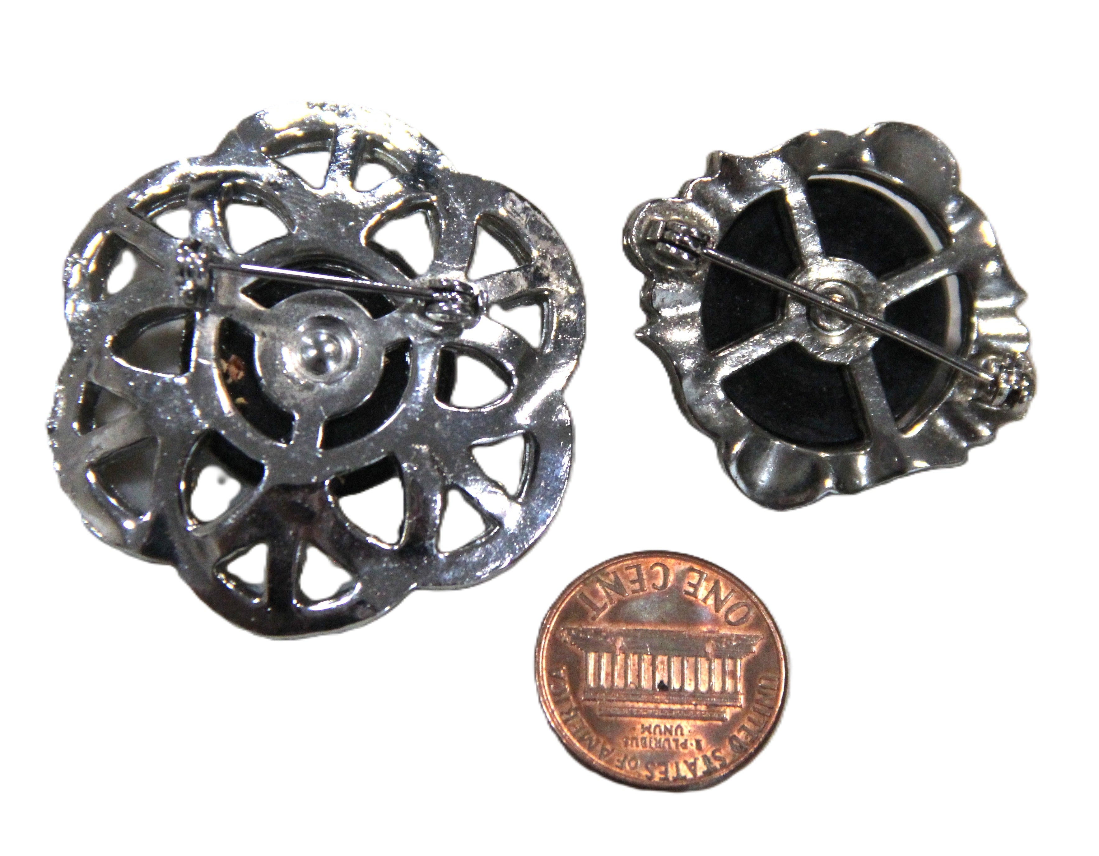 Pair of Art Deco black glass & crystal brooches