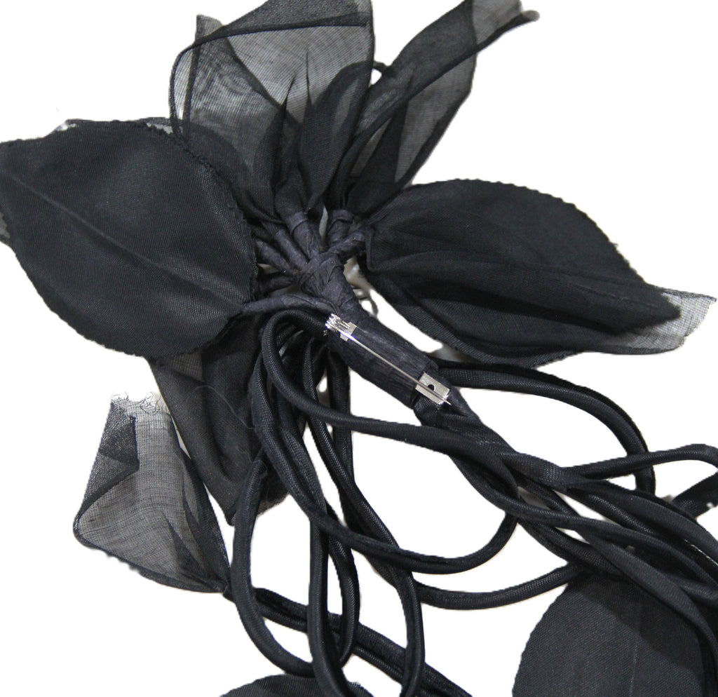 Vintage dramatic black flowy flower brooch