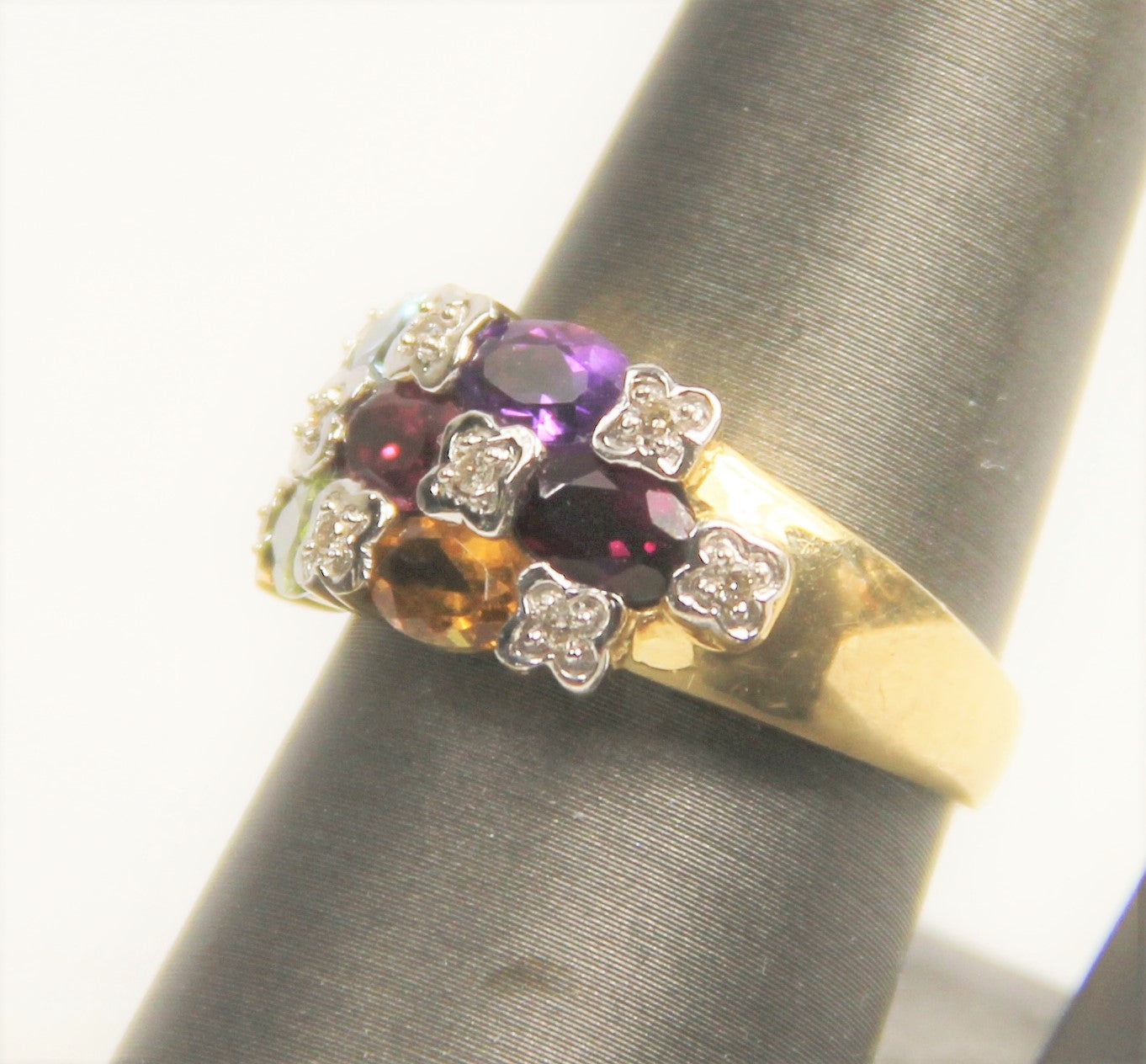 Multicolored gemstone ring with 14KT GOLD gold band by Samuel Benham
