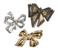 Bundle of vintage bow brooches