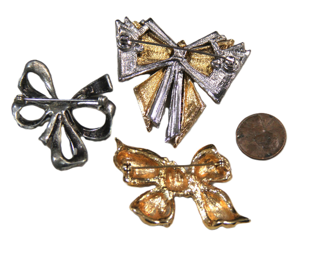 Bundle of vintage bow brooches